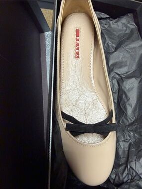 Prada Nude Leather Ballet Flat with Black Bow Accent